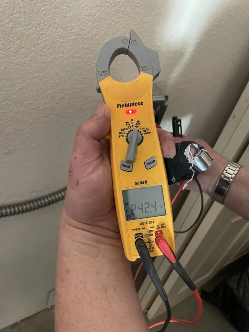 Voltage testing with clamp meter during Generator Installation in Southside